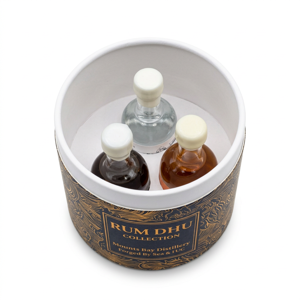 Open Rum Dhu gift box with three bottles on white